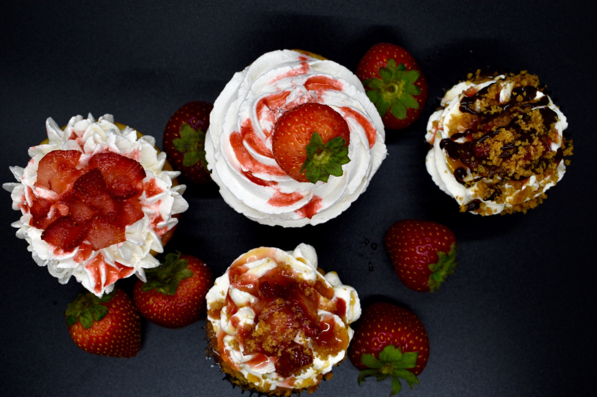 Strawberry-topped cupcakes from the Strawberry Social flavor collection